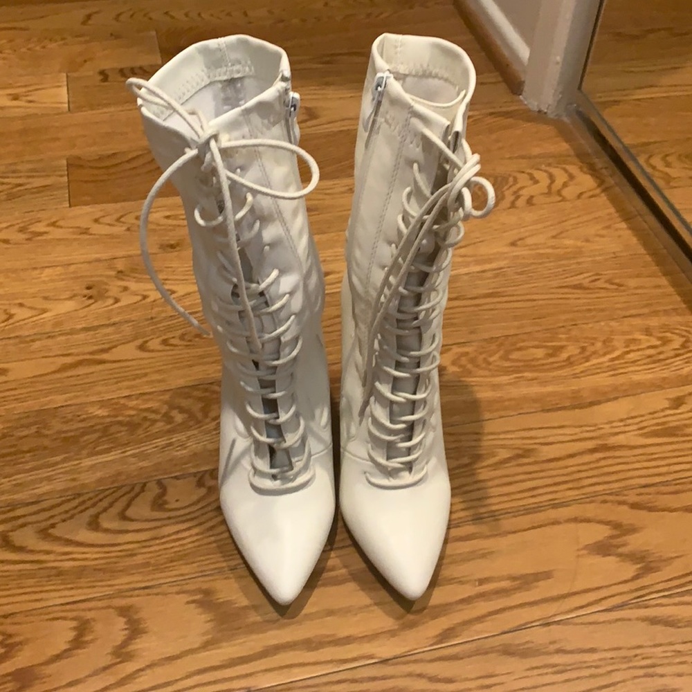 brand new pointy lace up white boots! Never worn!